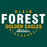 Close-up of Klein Forest High School Premium Forest Green Unisex T-shirt 12