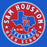 A circular red, white, and blue Sam Houston High School logo featuring the Texas state outline with an 'SH' monogram, surrounded by the words 'SAM HOUSTON HIGH SCHOOL' and 'TEXANS'.