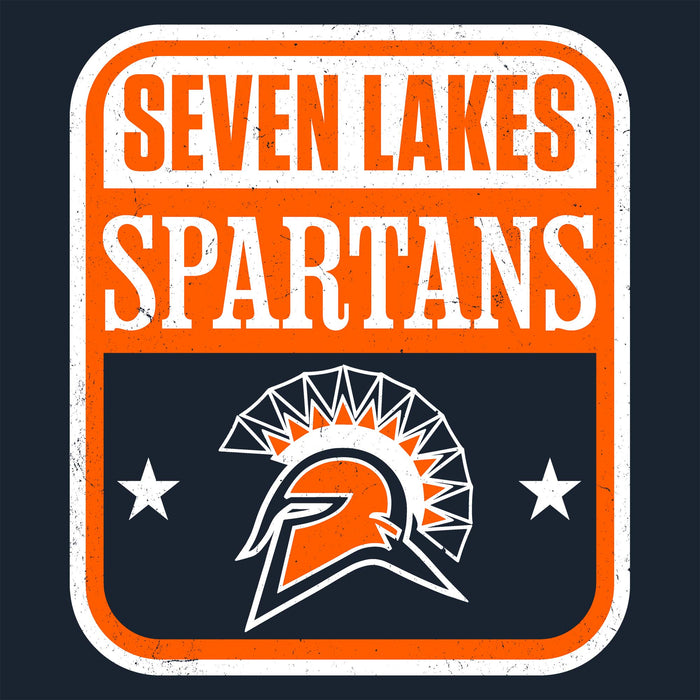A square graphic design for the Seven Lakes Spartans, featuring an orange and white distressed border with the words 'SEVEN LAKES SPARTANS' in white and orange, and a Spartan helmet logo below on a dark navy background. Seven Lakes High School Spartans Women's Navy Blue SoftStyle T-shirt 001