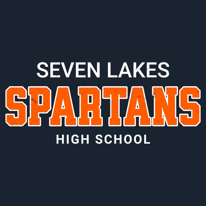 Text graphic reading 'SEVEN LAKES SPARTANS HIGH SCHOOL' on a dark navy background, with 'SPARTANS' in large distressed orange letters outlined in white and the other text in white. Seven Lakes High School Spartans Women's Navy Blue SoftStyle T-shirt 002