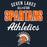A dark navy graphic design featuring the text 'SEVEN LAKES ALL STAR SPARTANS Athletics' in white and orange, with a Spartan helmet logo at the bottom. Seven Lakes High School Spartans Women's Navy Blue SoftStyle T-shirt 034