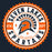 A circular school emblem reading 'SEVEN LAKES SPARTANS ATHL DEPT HIGH SCHOOL' with an orange, white, and navy Spartan helmet logo on a dark background. Seven Lakes High School Spartans Women's Navy Blue SoftStyle T-shirt 203
