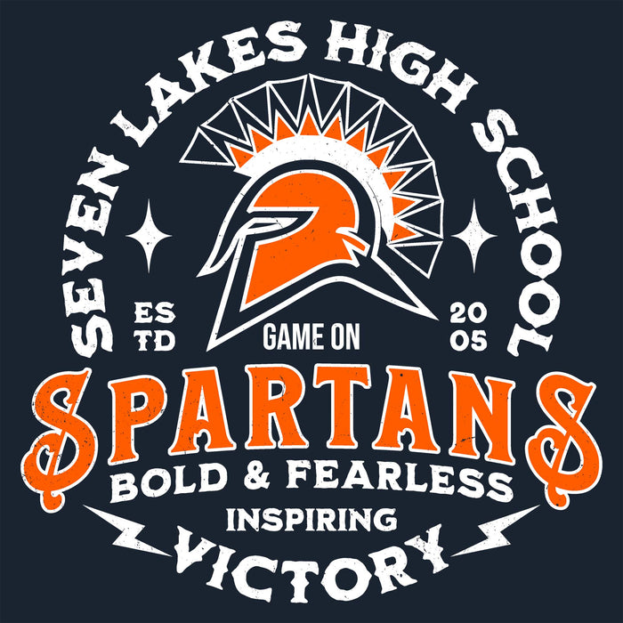 A circular school spirit graphic reading 'SEVEN LAKES HIGH SCHOOL' around a stylized Spartan helmet logo, with 'SPARTANS' in large orange letters and 'BOLD & FEARLESS INSPIRING VICTORY' below on a dark navy background. Seven Lakes High School Spartans Women's Navy Blue SoftStyle T-shirt 206