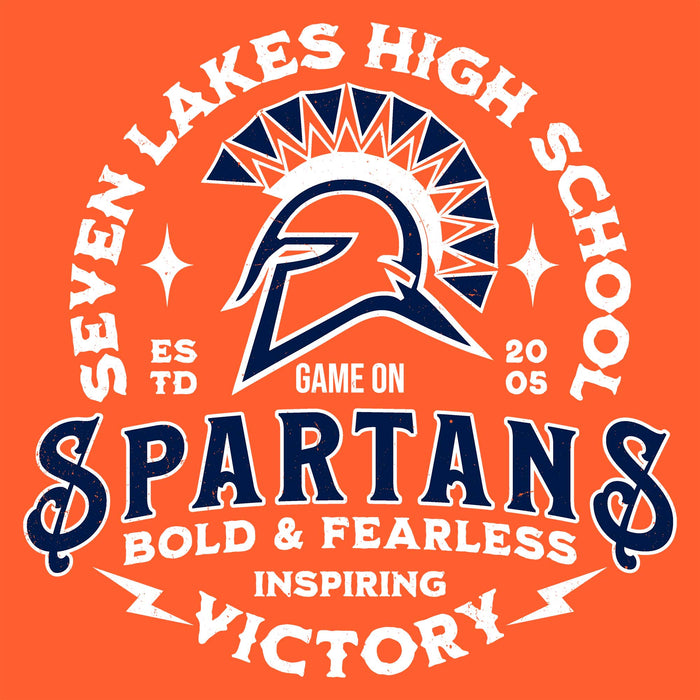 A circular graphic design on a bright orange background featuring a Spartan helmet logo and the text 'SEVEN LAKES HIGH SCHOOL', 'SPARTANS', 'BOLD & FEARLESS', and 'INSPIRING VICTORY' in white and navy blue. Seven Lakes High School Spartans Orange Classic Unisex T-shirt 206
