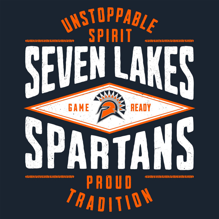 A graphic design for a t-shirt featuring the text 'UNSTOPPABLE SPIRIT SEVEN LAKES SPARTANS PROUD TRADITION' in distressed white and orange lettering, with a central diamond logo containing a Spartan helmet icon. 