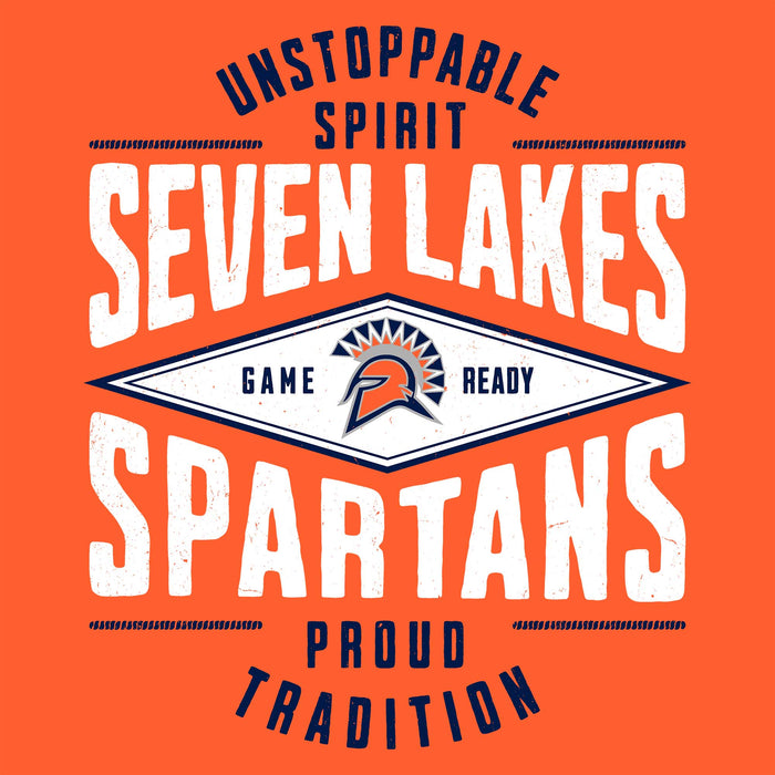 A graphic design on an orange background featuring the text 'UNSTOPPABLE SPIRIT', 'SEVEN LAKES', 'SPARTANS', and 'PROUD TRADITION' in white and navy blue, with a central diamond logo containing a Spartan helmet and the words 'GAME READY'. Seven Lakes High School Spartans Orange Classic Unisex T-shirt 210