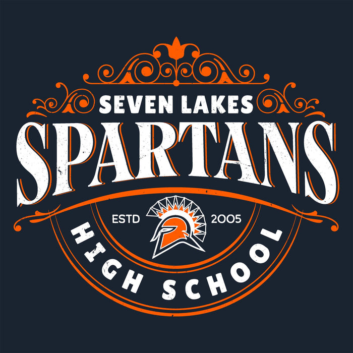 A circular school emblem reading 'SEVEN LAKES SPARTANS HIGH SCHOOL' with an orange and white Spartan helmet logo, on a dark navy background. Seven Lakes High School Spartans Women's Navy Blue SoftStyle T-shirt 211