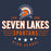 A graphic design for Seven Lakes Spartans High School featuring a Spartan helmet logo, the text 'SEVEN LAKES SPARTANS', 'ESTD 2005', and 'HIGH SCHOOL' on a dark navy blue background. Seven Lakes High School Spartans Unisex 3/4 sleeve Raglan T-shirt 217