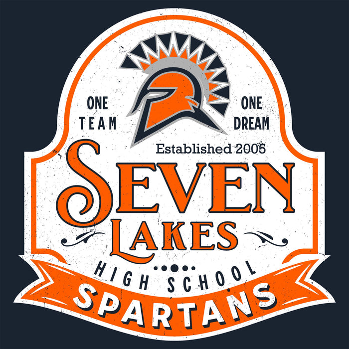 A distressed school spirit logo for Seven Lakes High School Spartans, featuring an orange and black Spartan helmet with a sunburst crest on a white shield-shaped background with orange and black text, set against a dark navy background. 