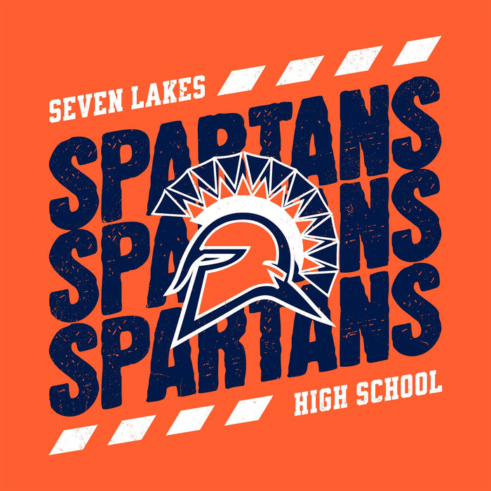 A graphic design featuring the word 'SPARTANS' repeated vertically in dark navy blue distressed text on a bright orange background, with a Spartan helmet and crest in the center. White text reads 'SEVEN LAKES' at the top and 'HIGH SCHOOL' at the bottom, with white dash-like stripes in the corners. Seven Lakes High School Spartans Orange Classic Unisex T-shirt 223