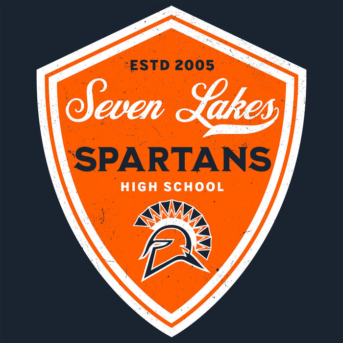 A shield-shaped orange and white logo with the text 'ESTD 2005 Seven Lakes SPARTANS HIGH SCHOOL' and a Spartan helmet graphic, centered on a dark navy background. Seven Lakes High School Spartans Women's Navy Blue SoftStyle T-shirt 225