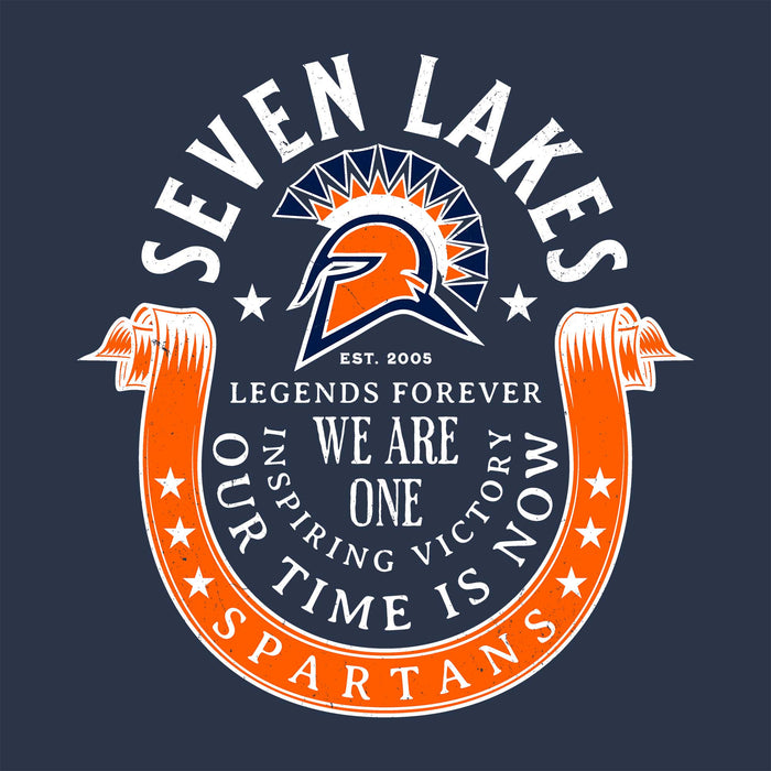 A circular graphic design on a dark navy background featuring the words 'SEVEN LAKES' at the top and 'SPARTANS' at the bottom, with a Spartan helmet emblem in the center and orange ribbon banners curving around the lower half. Text includes 'LEGENDS FOREVER', 'WE ARE ONE', and 'OUR TIME IS NOW'. Seven Lakes High School Spartans Unisex 3/4 sleeve Raglan T-shirt 229