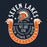 A circular graphic design featuring a Spartan helmet and the text 'SEVEN LAKES' at the top, 'LEGENDS FOREVER', 'WE ARE ONE', 'OUR TIME IS NOW', and 'SPARTANS' on an orange ribbon at the bottom, on a dark navy background. Seven Lakes High School Spartans Navy Blue Classic Unisex T-shirt 229