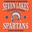 A graphic design featuring the text 'LEGENDS FOREVER SEVEN LAKES NEVER BACK DOWN' and 'SPARTANS HIGH SCHOOL' in white and navy blue lettering on a solid orange background, with a Spartan helmet logo in the center. Seven Lakes High School Spartans Orange Classic Unisex T-shirt 230