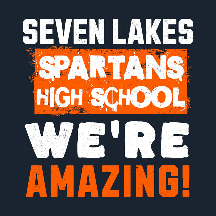 A graphic design with the text 'SEVEN LAKES SPARTANS HIGH SCHOOL WE'RE AMAZING!' in distressed white and orange lettering on a dark navy background. Seven Lakes High School Spartans Women's Navy Blue SoftStyle T-shirt 231