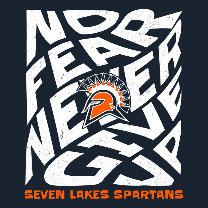 A graphic design featuring the words 'NO FEAR NEVER GIVE UP' and 'SEVEN LAKES SPARTANS' in stylized white lettering with distressed textures, set against a dark navy background. A Spartan helmet logo with an orange and white sunburst is positioned in the center. Seven Lakes High School Spartans Women's Navy Blue SoftStyle T-shirt 236