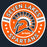 A circular orange, white, and black graphic design reading 'SEVEN LAKES SPARTANS' with 'ESTD 2005' and 'Get Fired Up' text, centered on a dark navy background. Seven Lakes High School Spartans Women's Navy Blue SoftStyle T-shirt 239