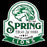 A vintage-style Spring High School Lions emblem or sticker design on a black background. The white shield-shaped graphic features a green lion head, the words 'SPRING HIGH SCHOOL,' 'EST 1969,' 'HEART OF A CHAMPION,' and 'LIONS. Spring High School Lions Black Classic Unisex T-shirt 219