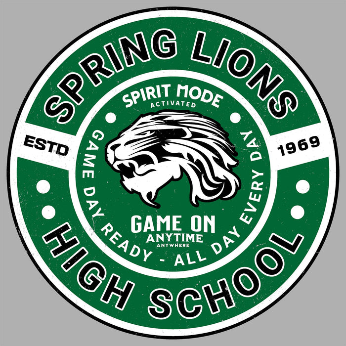 A circular green, white, and black graphic design featuring a lion head illustration in the center, with the text 'SPRING LIONS HIGH SCHOOL' and additional phrases like 'SPIRIT MODE ACTIVATED' and 'GAME DAY READY - ALL DAY ANYTIME' on a gray background. Spring High School Lions Women's Grey SoftStyle T-shirt 239