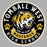 A circular Tomball West High School Mustangs logo graphic on a gray background. The design features a black textured background with a white outer border, white text reading 'TOMBALL WEST' and 'HIGH SCHOOL', a central gold and white Mustang head illustration, two gold paw prints, and a gold banner reading 'GAME DAY READY MUSTANGS'. Tomball West High School Tigers Grey Classic Unisex T-shirt 215