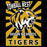 Tomball West High School Tigers graphic featuring a roaring tiger mascot head on a black and gold sunburst background with the text 'TOMBALL WEST HIGH SCHOOL TIGERS'. Tomball West High School Tigers Women's Black SoftStyle T-shirt 226
