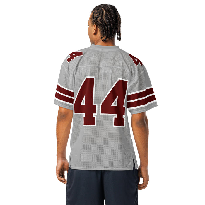 Back view of man wearing Lewisville High School Farmers Football Jersey 44