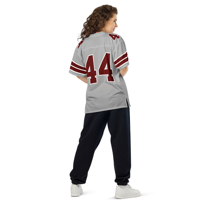 Back view of woman wearing Lewisville High School Farmers Football Jersey 44
