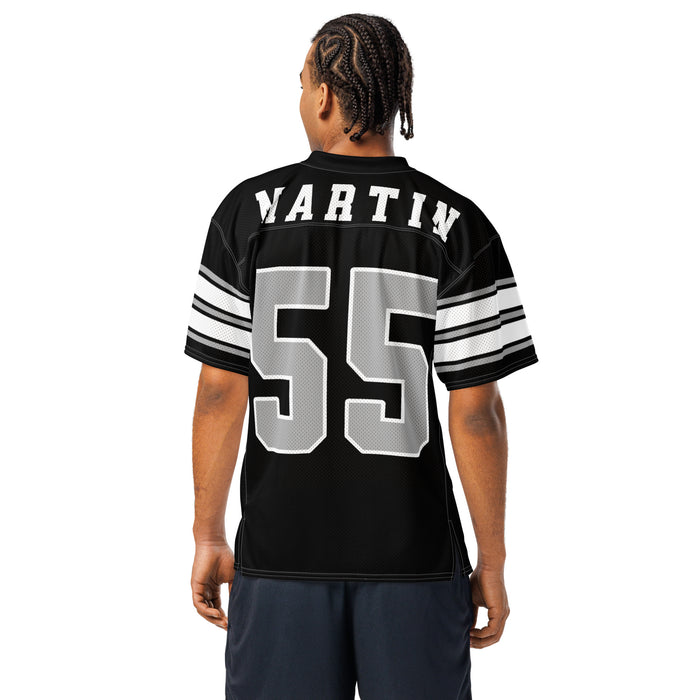 Back view of man wearing Martin High School Warriors Football Jersey 55