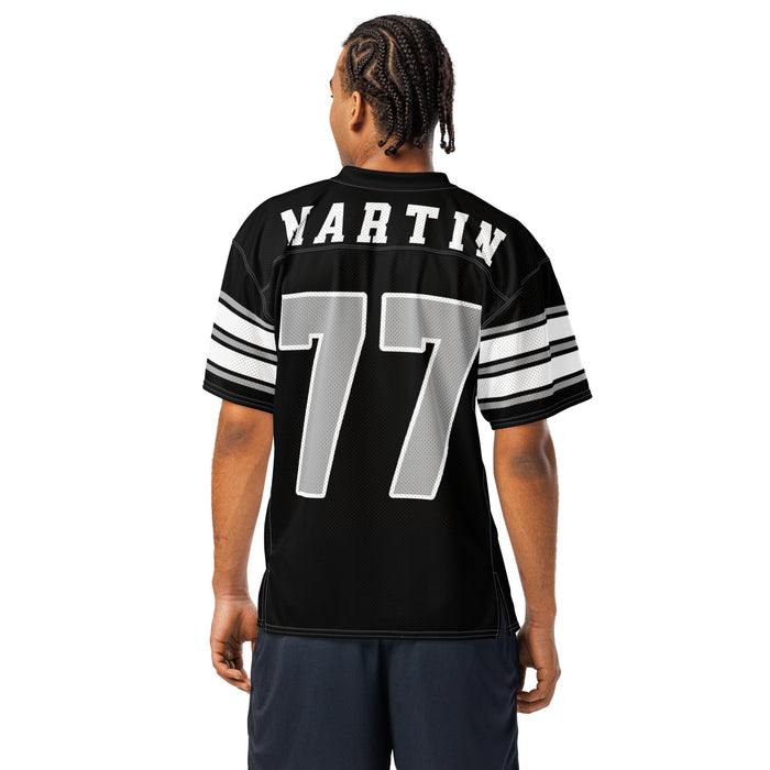 Back view of man wearing Martin High School Warriors Football Jersey 77