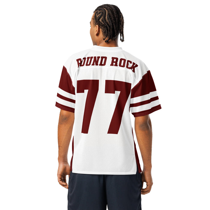 Back view of man wearing Round Rock High School Dragons Football Jersey 77