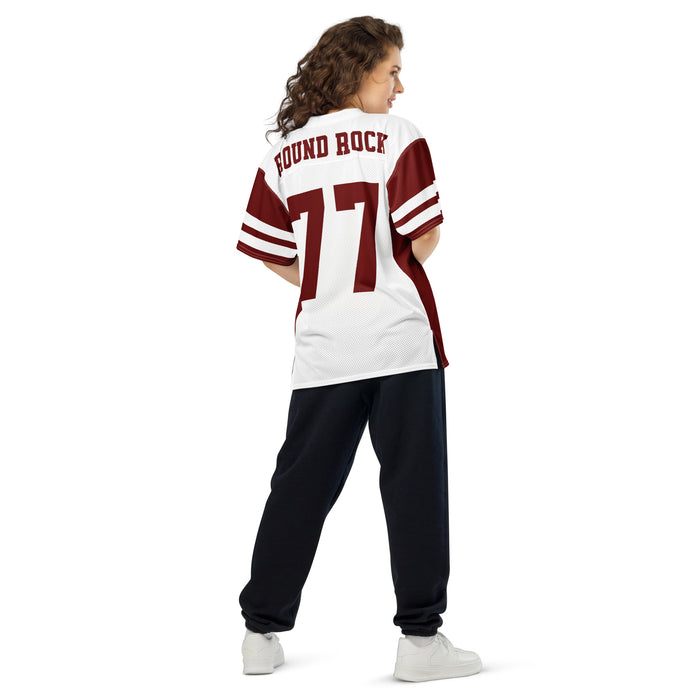 Back view of woman wearing Round Rock High School Dragons Football Jersey 77