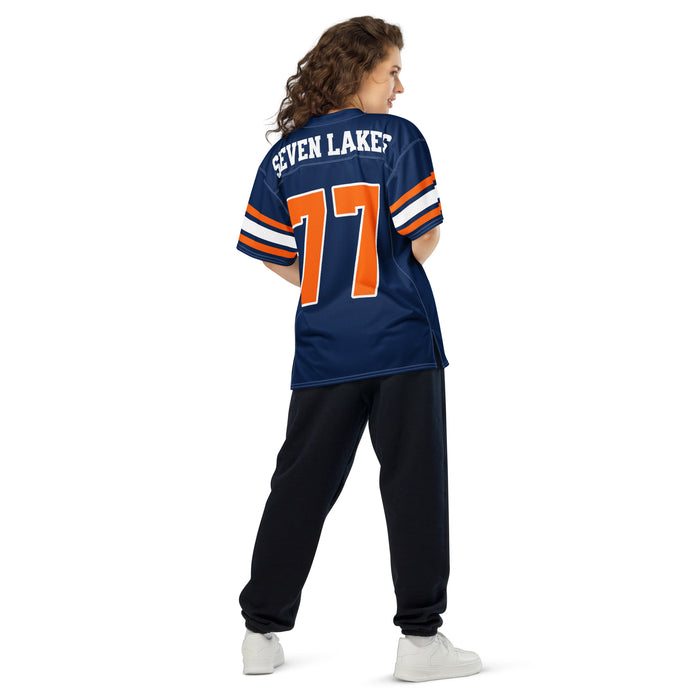 Back view of woman wearing Seven Lakes High School Spartans Football Jersey 77