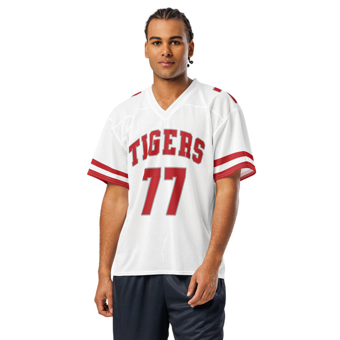 Man wearing Katy High School Tigers Football Jersey 77