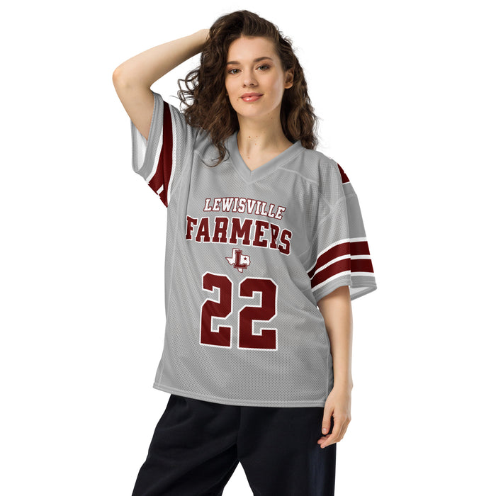 Woman wearing Lewisville High School Farmers Football Jersey 22