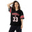 Woman wearing MacArthur High School Generals Football Jersey 33
