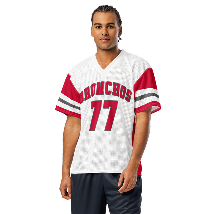 Man wearing Odessa High School Bronchos Football Jersey 77