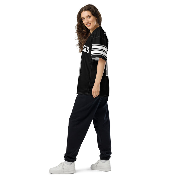 Side view of woman wearing Martin High School Warriors Football Jersey 11