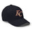 Profile view of Klein Collins High School Tigers Flexfit Navy Blue Baseball Cap 202