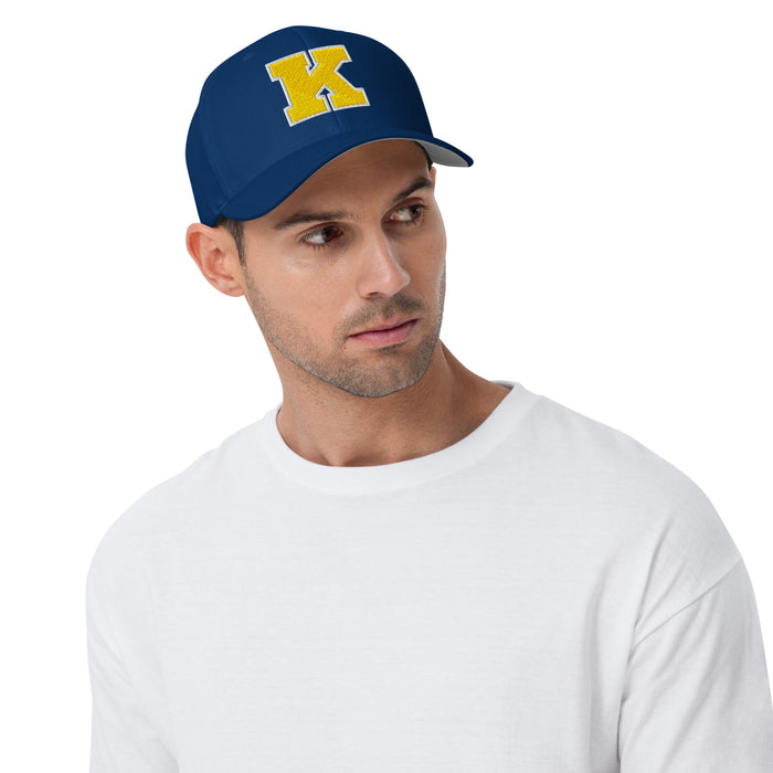Man wearing Klein High School Bearkats Flexfit Royal Baseball Cap 200