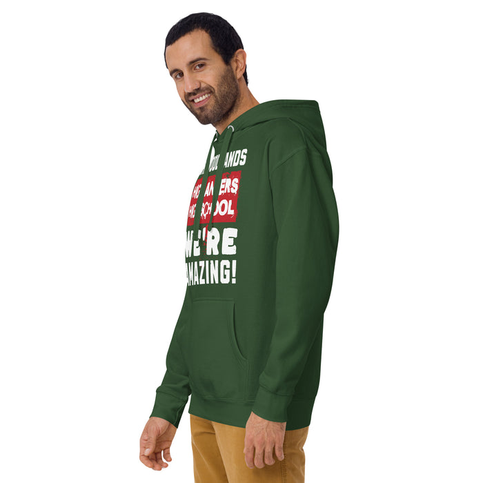 Man wearing The Woodlands High School Highlanders Forest Green Premium Unisex Hoodie 231