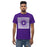 A man wearing a Klein Cain High School Hurricanes Purple Classic T-shirt 27