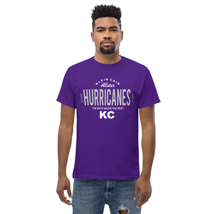 A man wearing a Klein Cain High School Hurricanes Purple Classic T-shirt 40