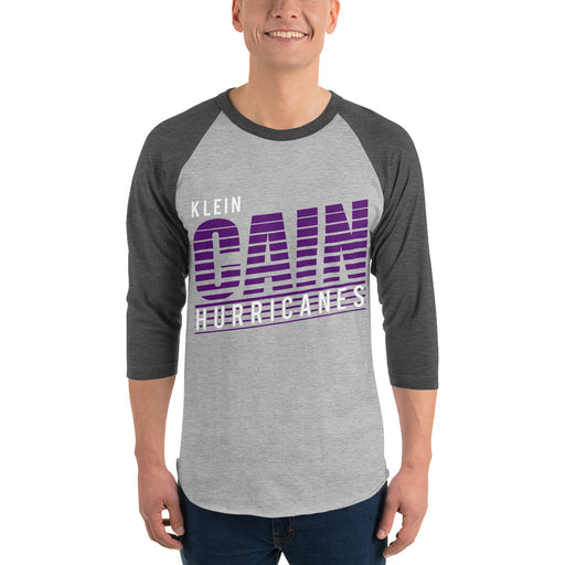 Man wearing a Klein Cain High School Hurricanes Unisex 3/4 Sleeve Raglan T-shirt 32