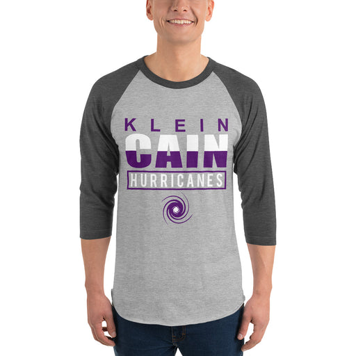 Man wearing a Klein Cain High School Hurricanes Unisex 3/4 Sleeve Raglan T-shirt 29