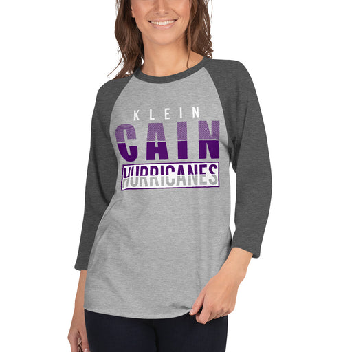 Woman wearing a Klein Cain High School Hurricanes Unisex 3/4 Sleeve Raglan T-shirt 31