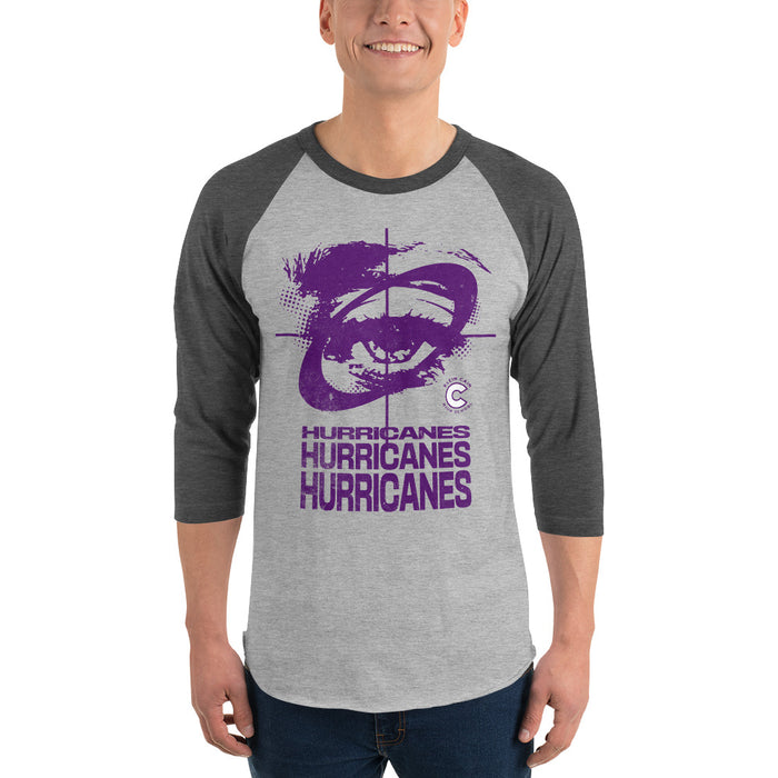 Man wearing a Klein Cain High School Hurricanes Unisex 3/4 Sleeve Raglan T-shirt 230