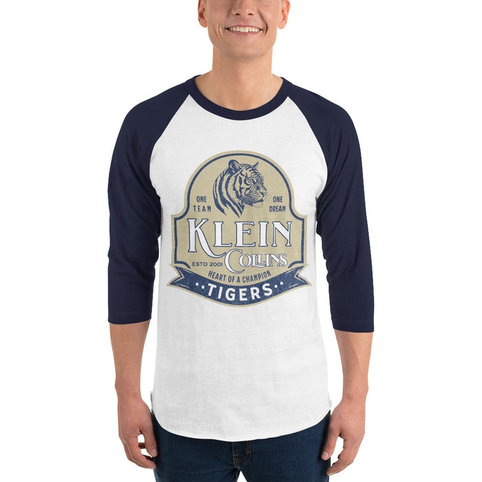 Man wearing a Klein Collins High School Tigers Unisex 3/4 Sleeve Raglan T-shirt 205