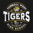 A circular graphic design on a black background featuring the words 'TOMBALL WEST' at the top, a tiger head mascot logo in the center, 'TIGERS' in large distressed white letters, 'ESTD 2026' and 'LOUD PROUD LET'S GO TEAM' in the middle, and 'HIGH SCHOOL' at the bottom. The design uses white and gold/yellow colors. Tomball West High School Tigers Black Classic Unisex Hoodie 218