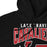 Close-up view of a black hoodie showing hood and drawcords for Lake Travis High School. Design #213