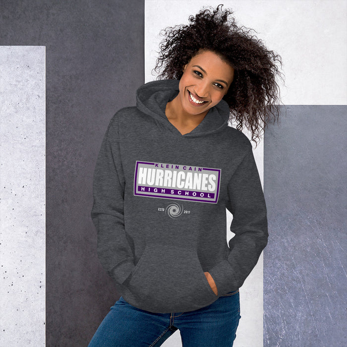 Woman wearing a Klein Cain High School Hurricanes Dark Heather Classic Hoodie 49